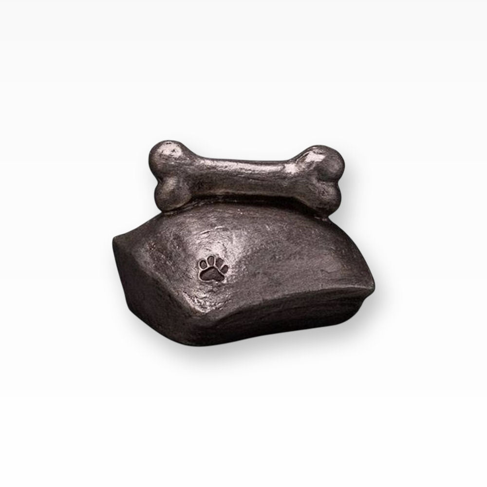 Hundeurne Knochen auf Kissen