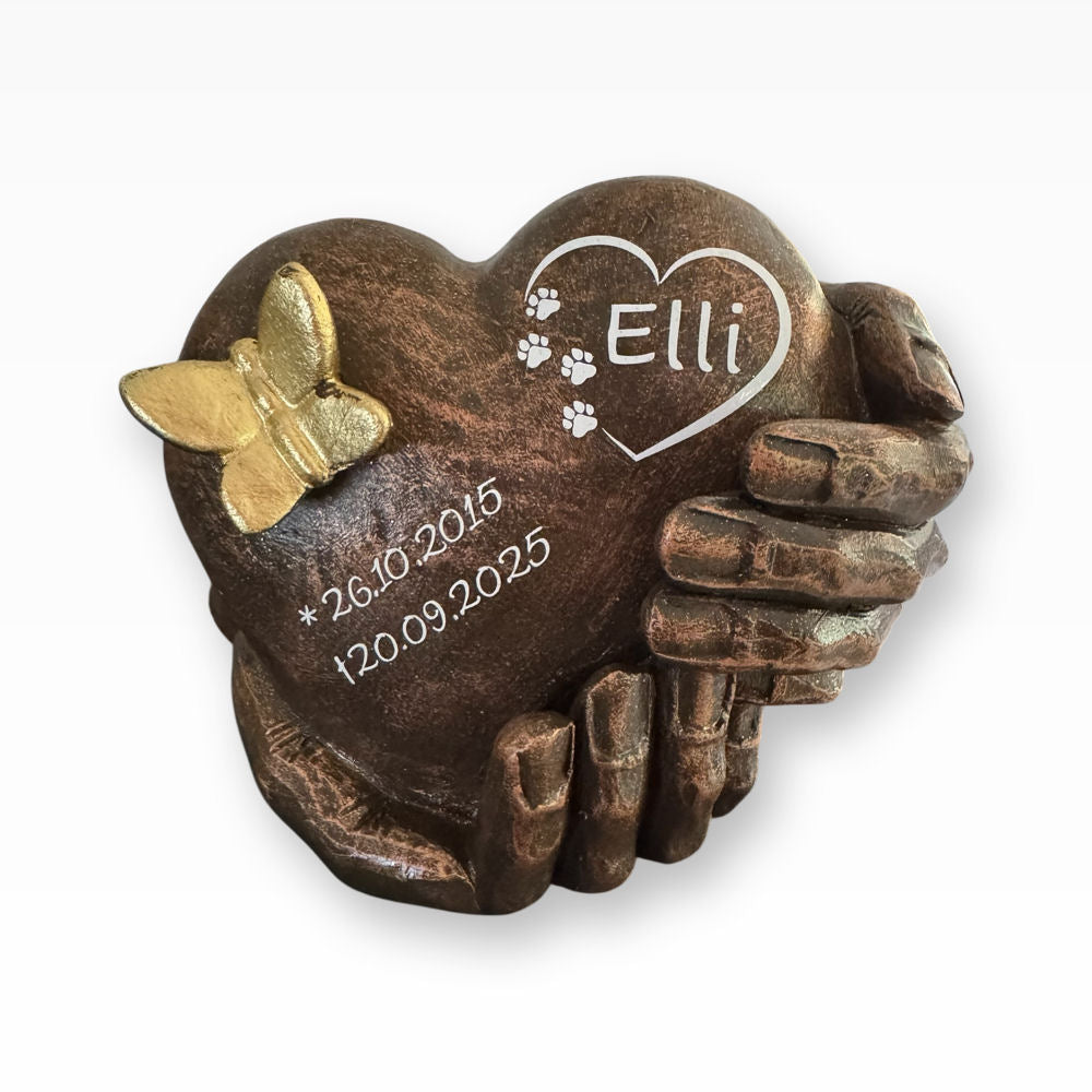 Tierurne für Zuhause Keramikurne Herz in Hände mit Schmetterling