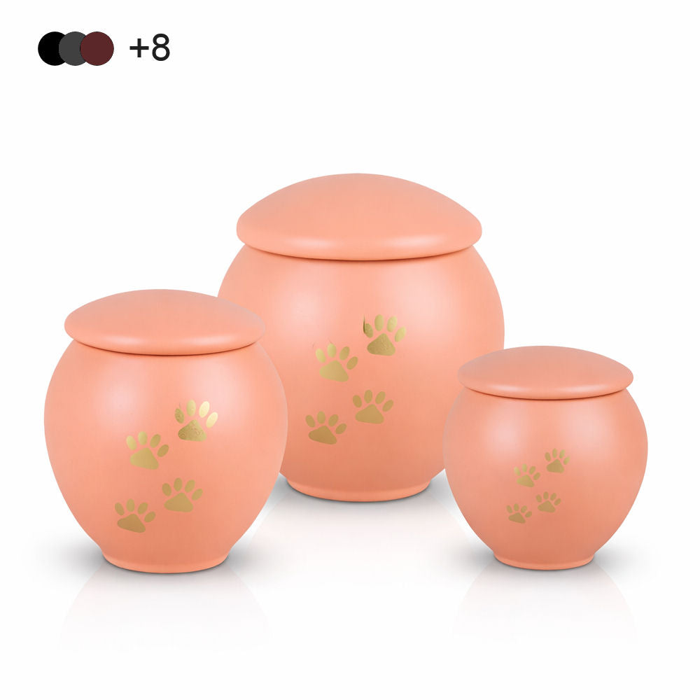 Tierurne mit Pfotenmotiv – Würdevolle Erinnerung für treue Begleiter