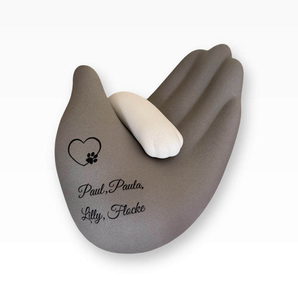 Tierurne Vertrautheit Pfote in Hand