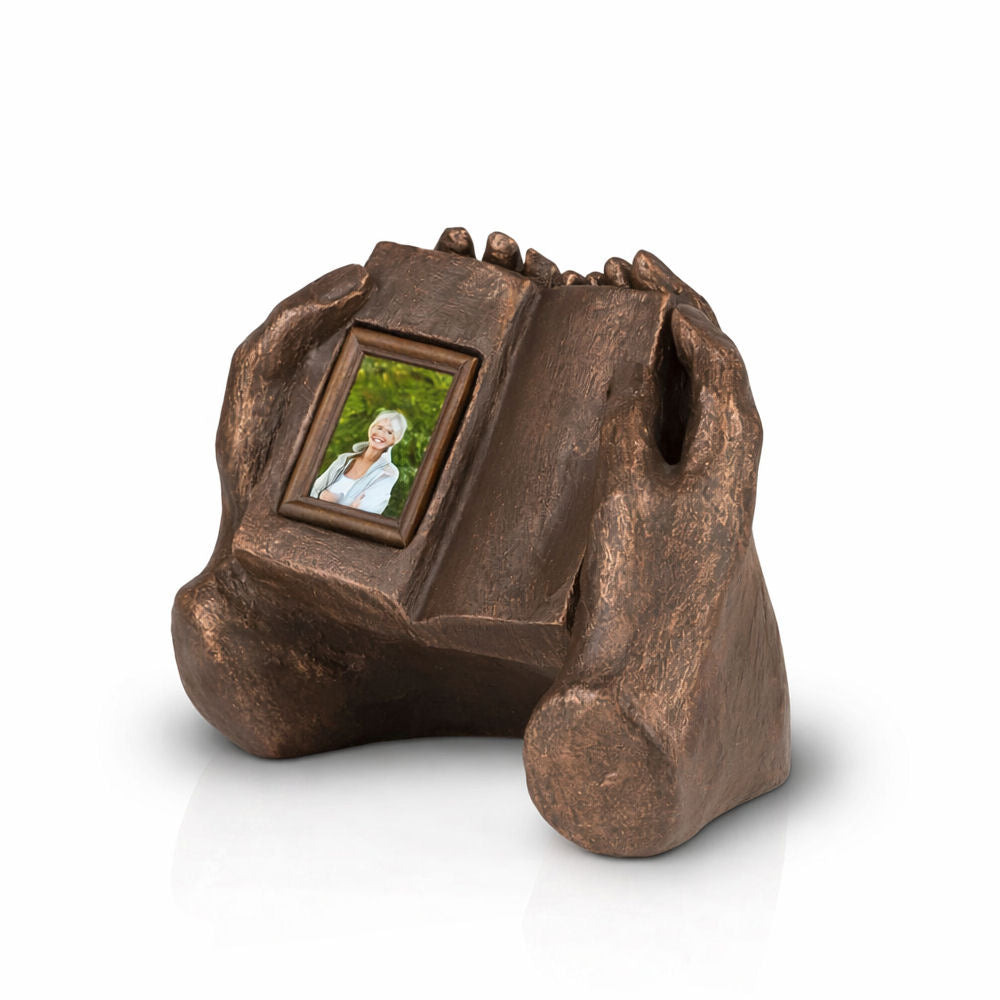 Keramikurne mit Buchmotiv und Bilderrahmen